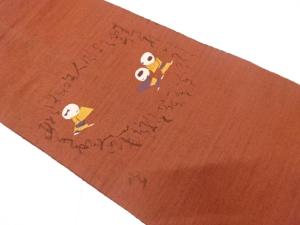 童子に文字模様織り出し　紬　名古屋帯